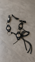 Cinto negro con aros